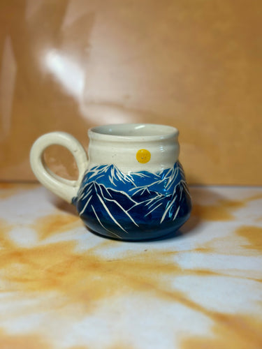 12oz mountains and sun mug