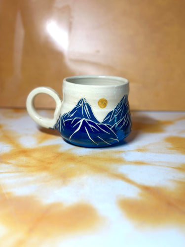 12oz mountains and sun mug