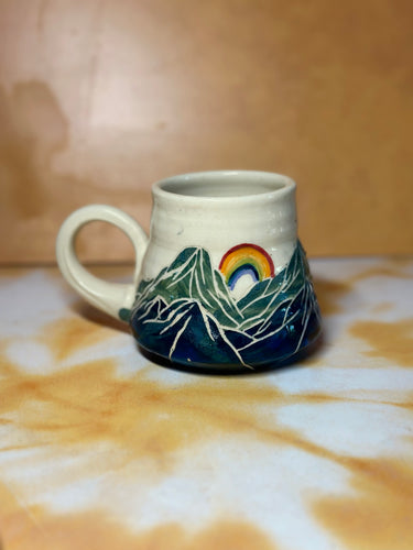 2nd 12oz mountains and sun mug and rainbow